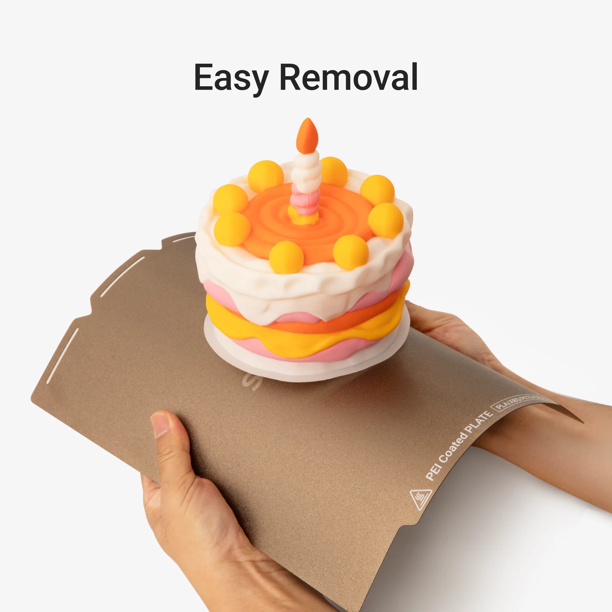 Snapmaker U1 textured PEI plate help remove a finished 3D printed cake with less effort.
