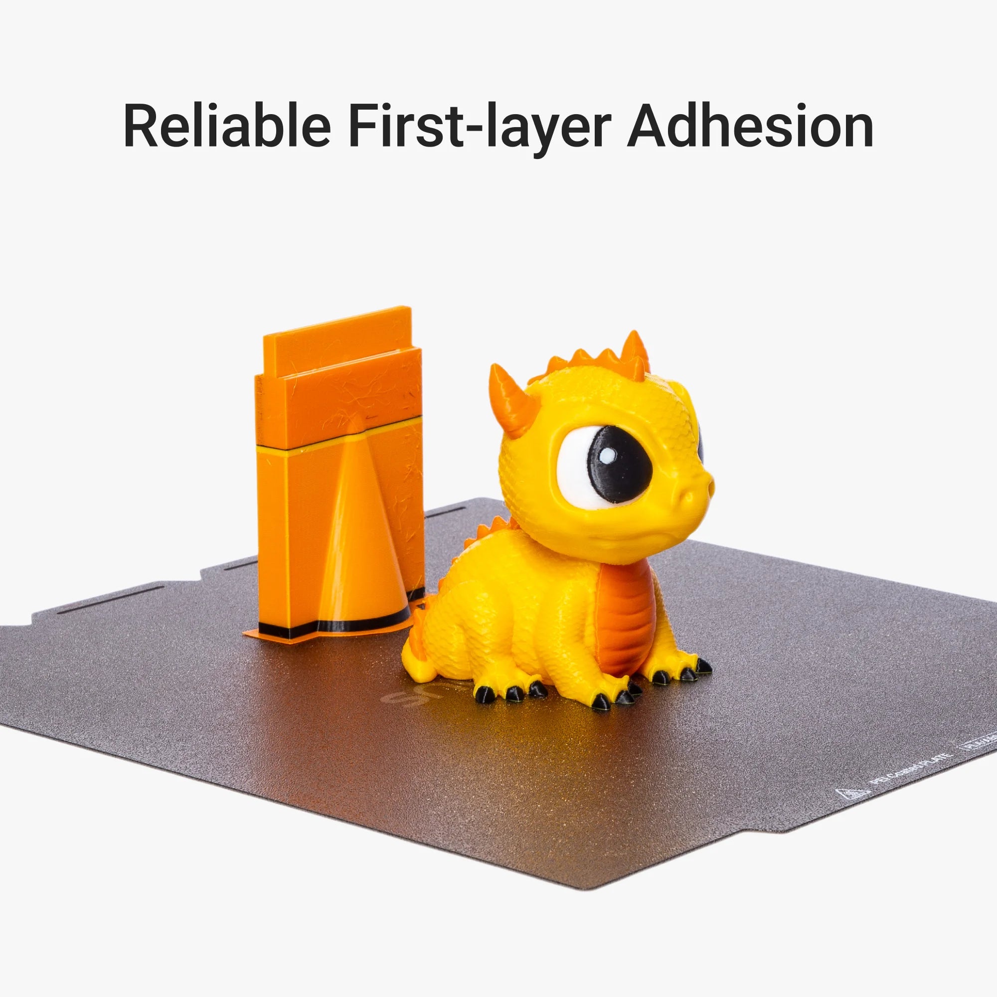3D printed dragon model on Textured PEI Steel Plate for steady print adhesion.
