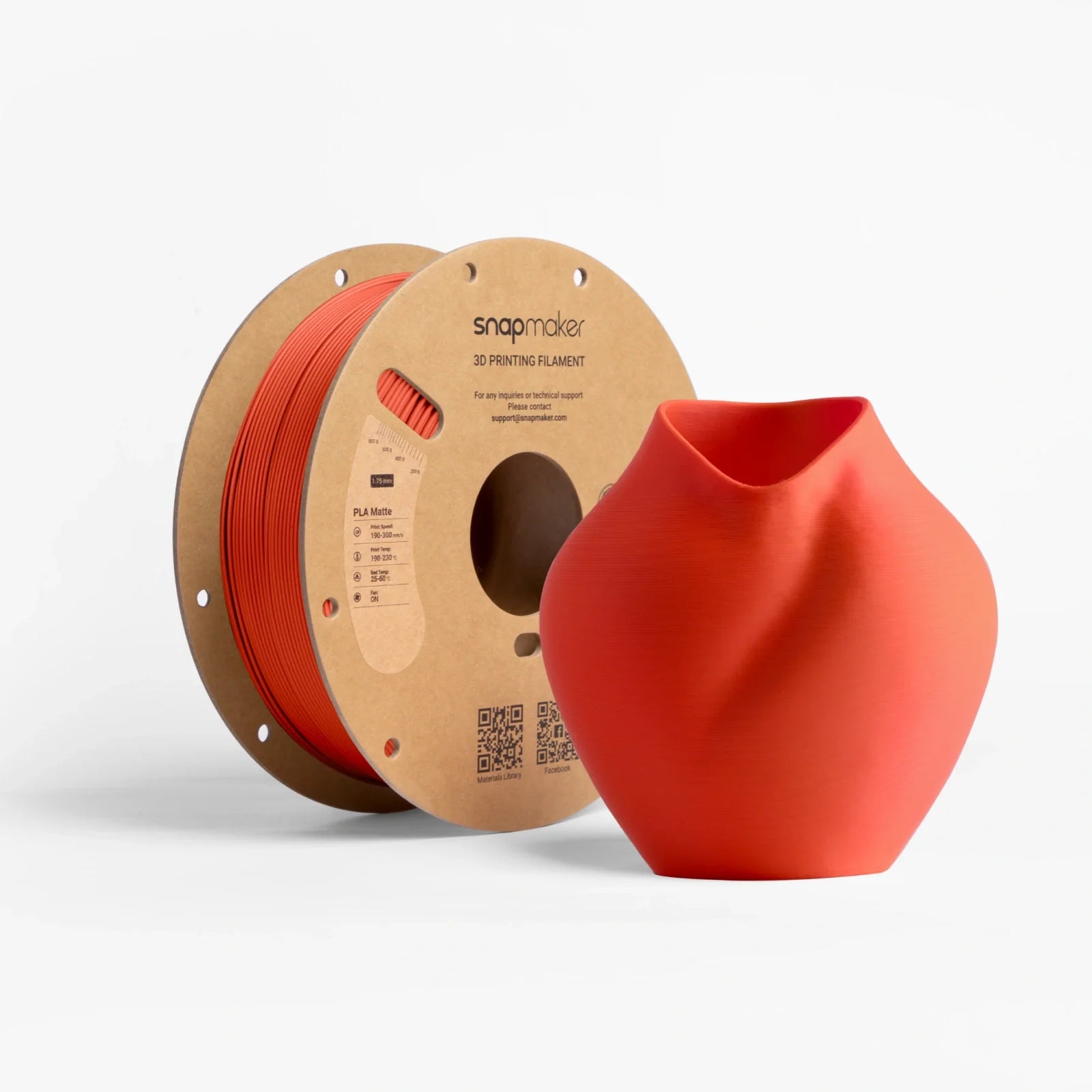 Snapmaker Matte PLA Filament in red with a vibrant red vase showing fine print lines.