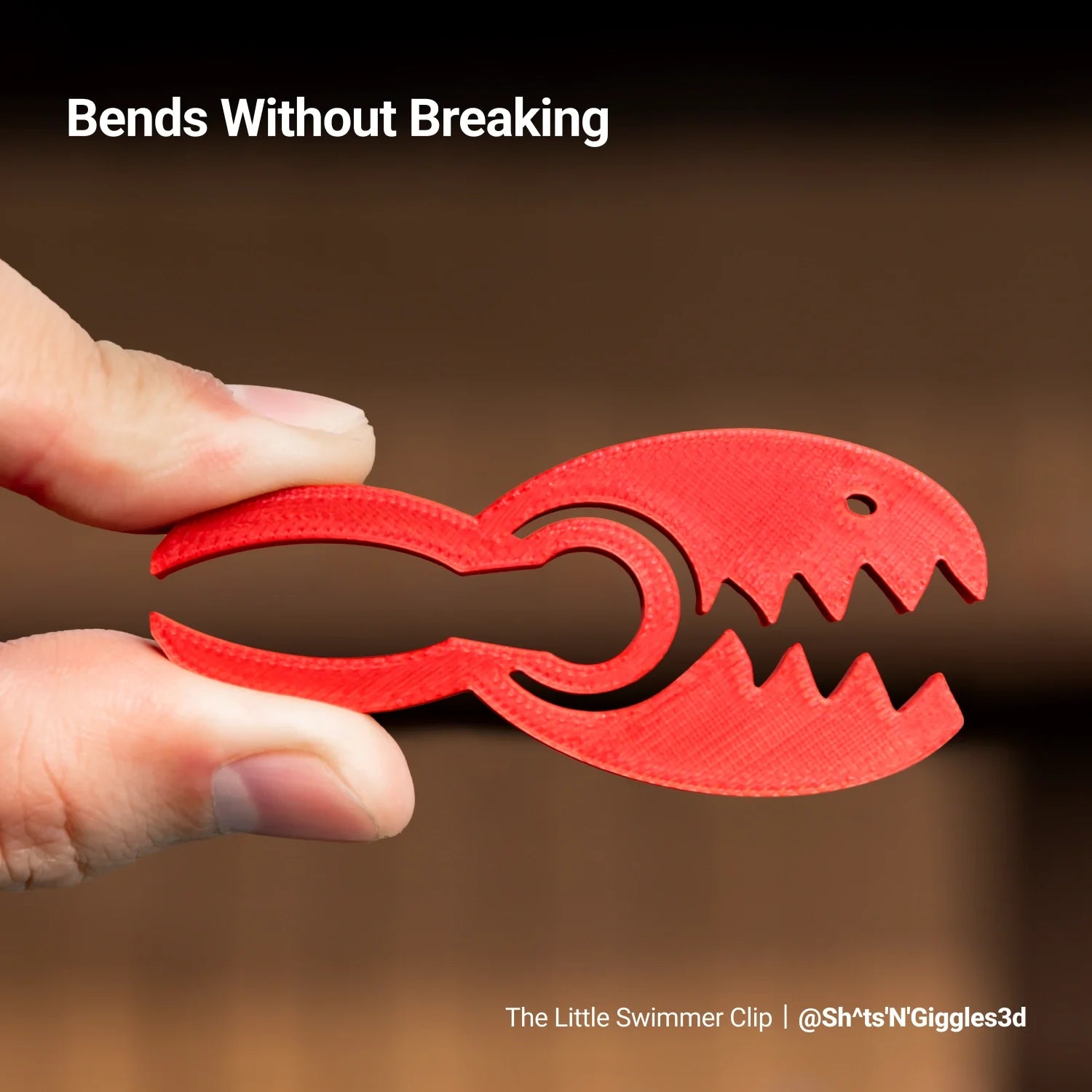 Silk PLA Filament (RFID) forms a red lobster clip with crisp edges and a polished surface.