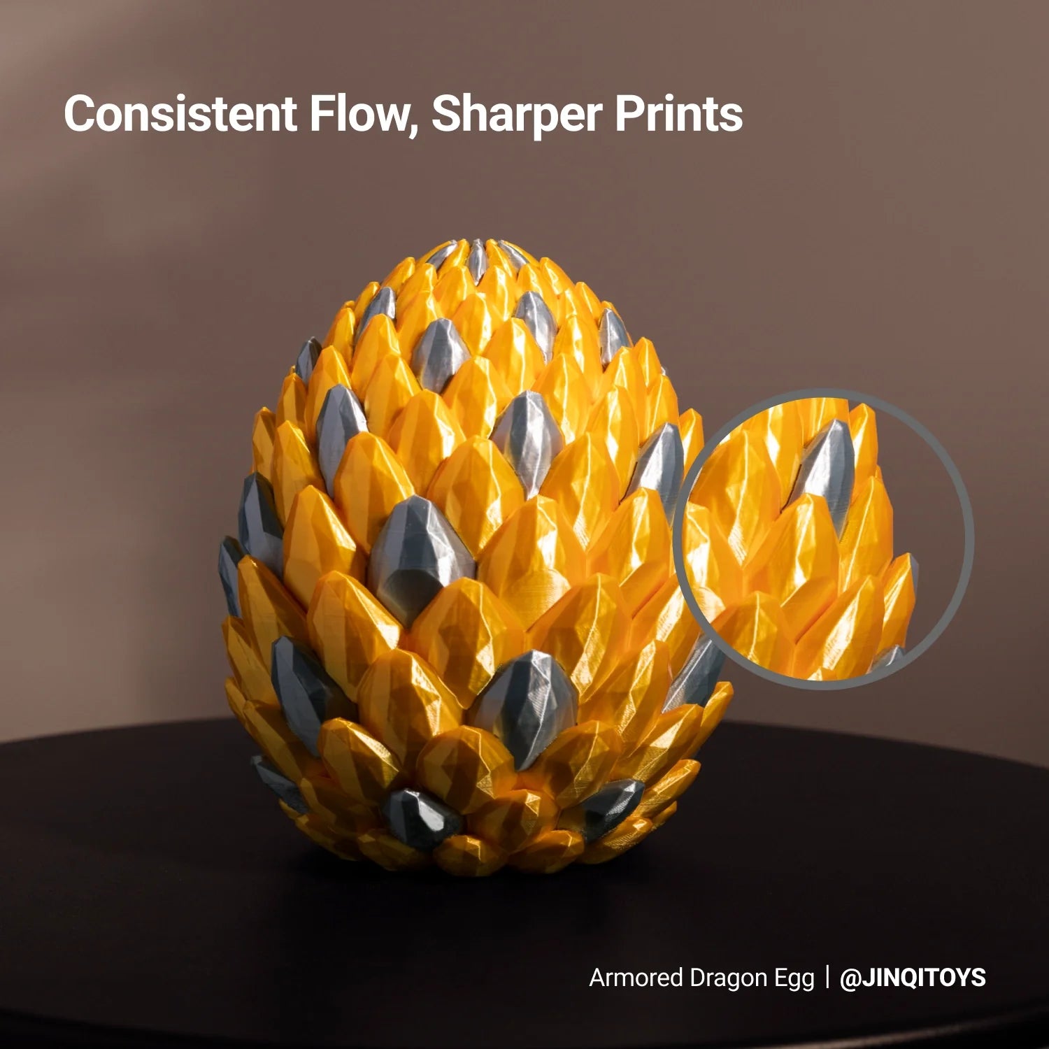 A dragon egg model printed with Silk PLA Filament (RFID) shows bright color and refined surface detail.
